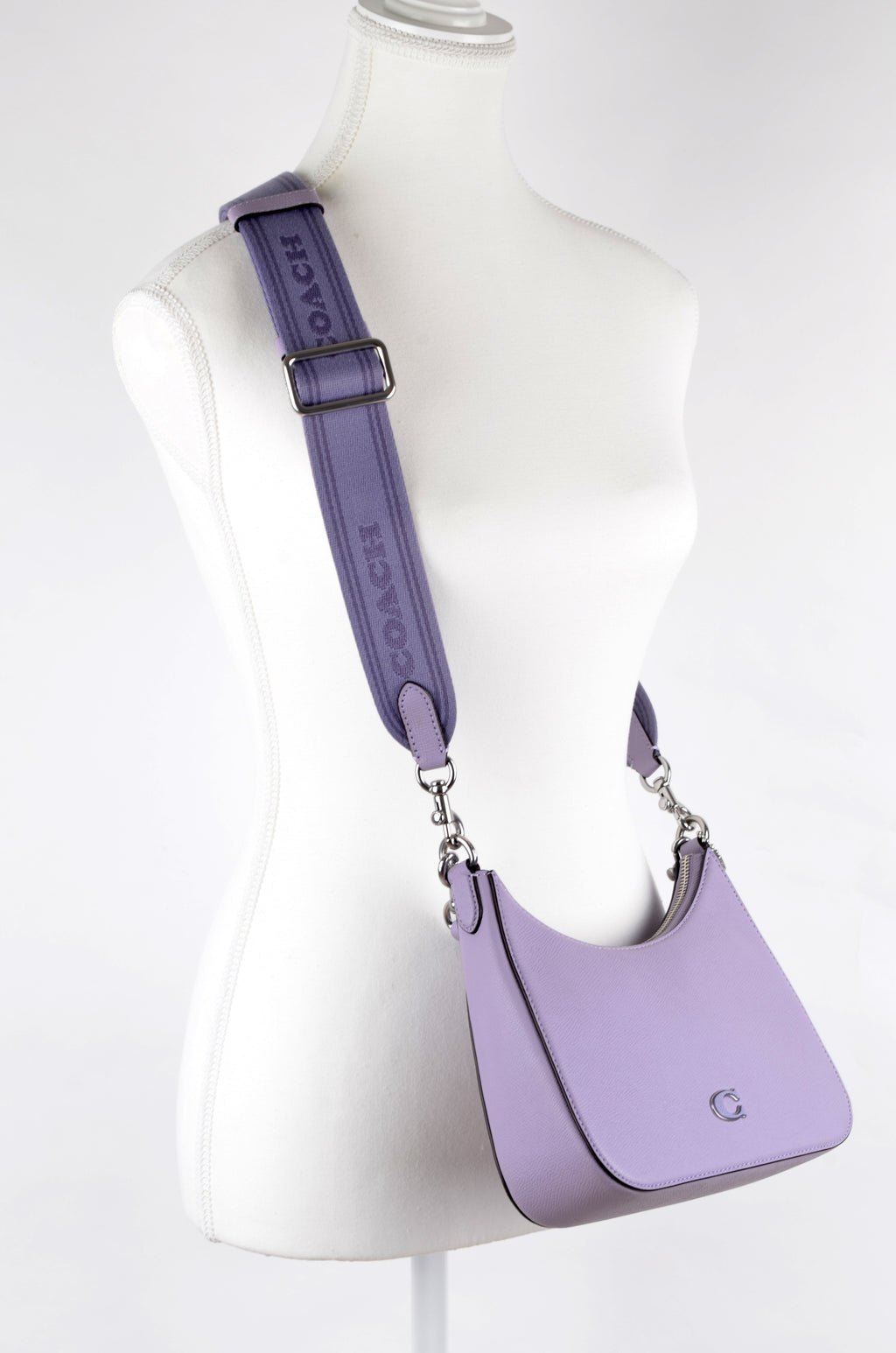 Bolsa Coach de Hombro Lila con Correa Ancha