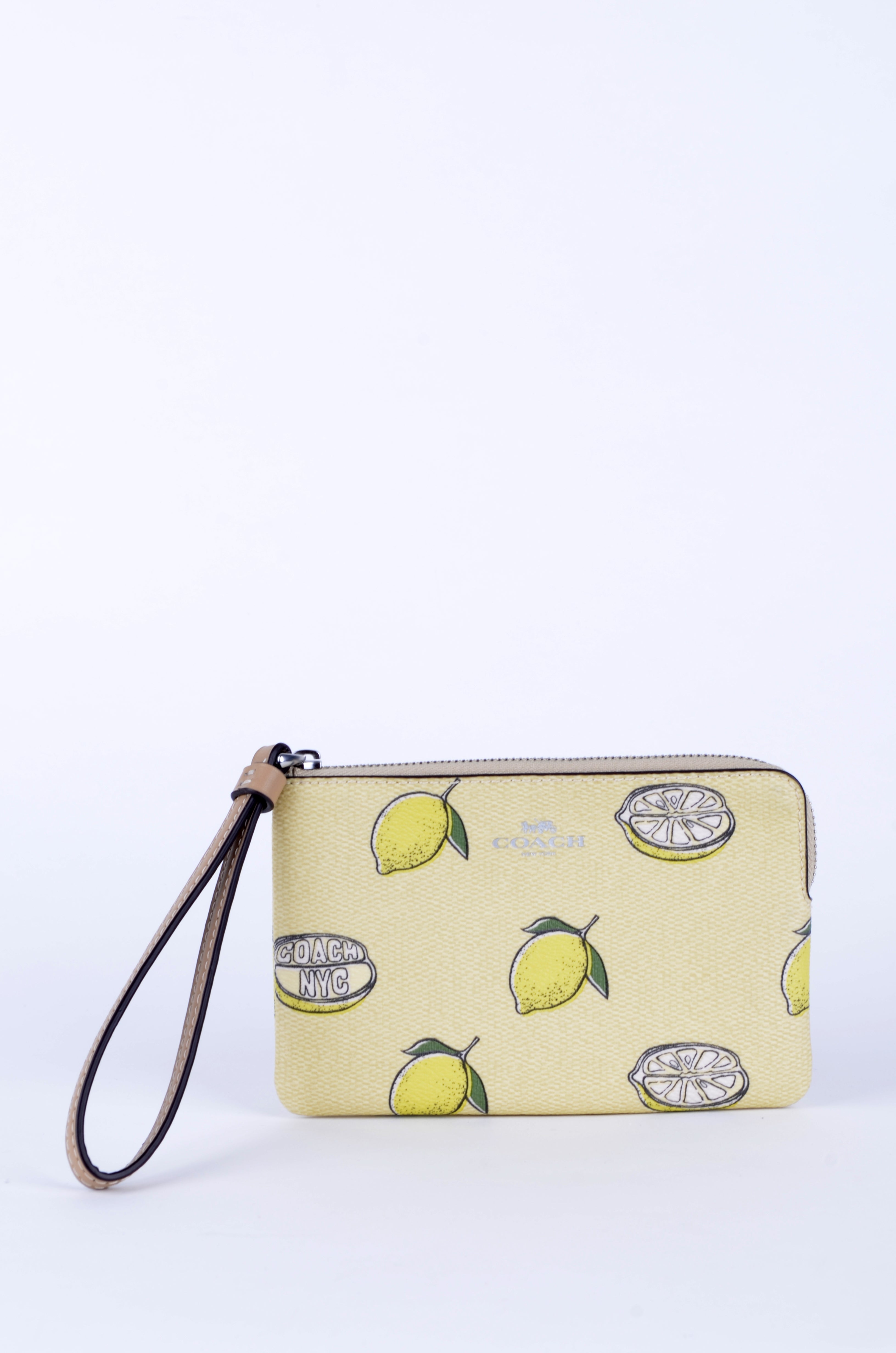 Muñequera Coach Amarilla con Estampado de Limones