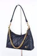 Bolsa de Hombro Coach en Piel Acolchada – Estilo Cary / Baguette