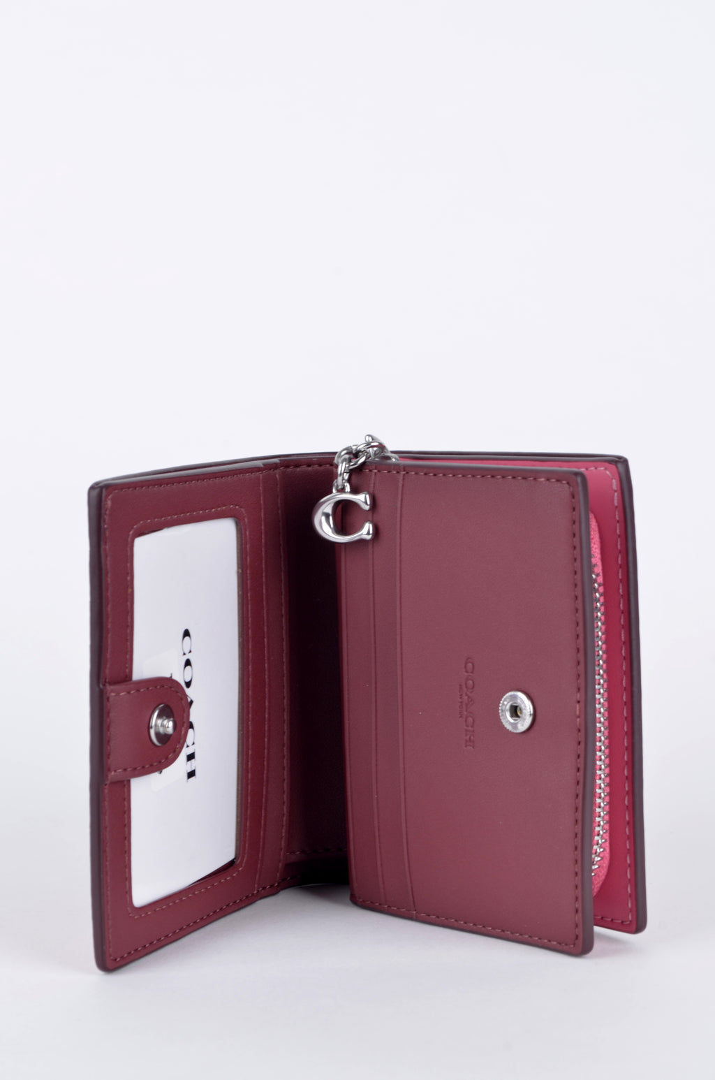 Cartera Coach Compacta Roja con Estampado Floral