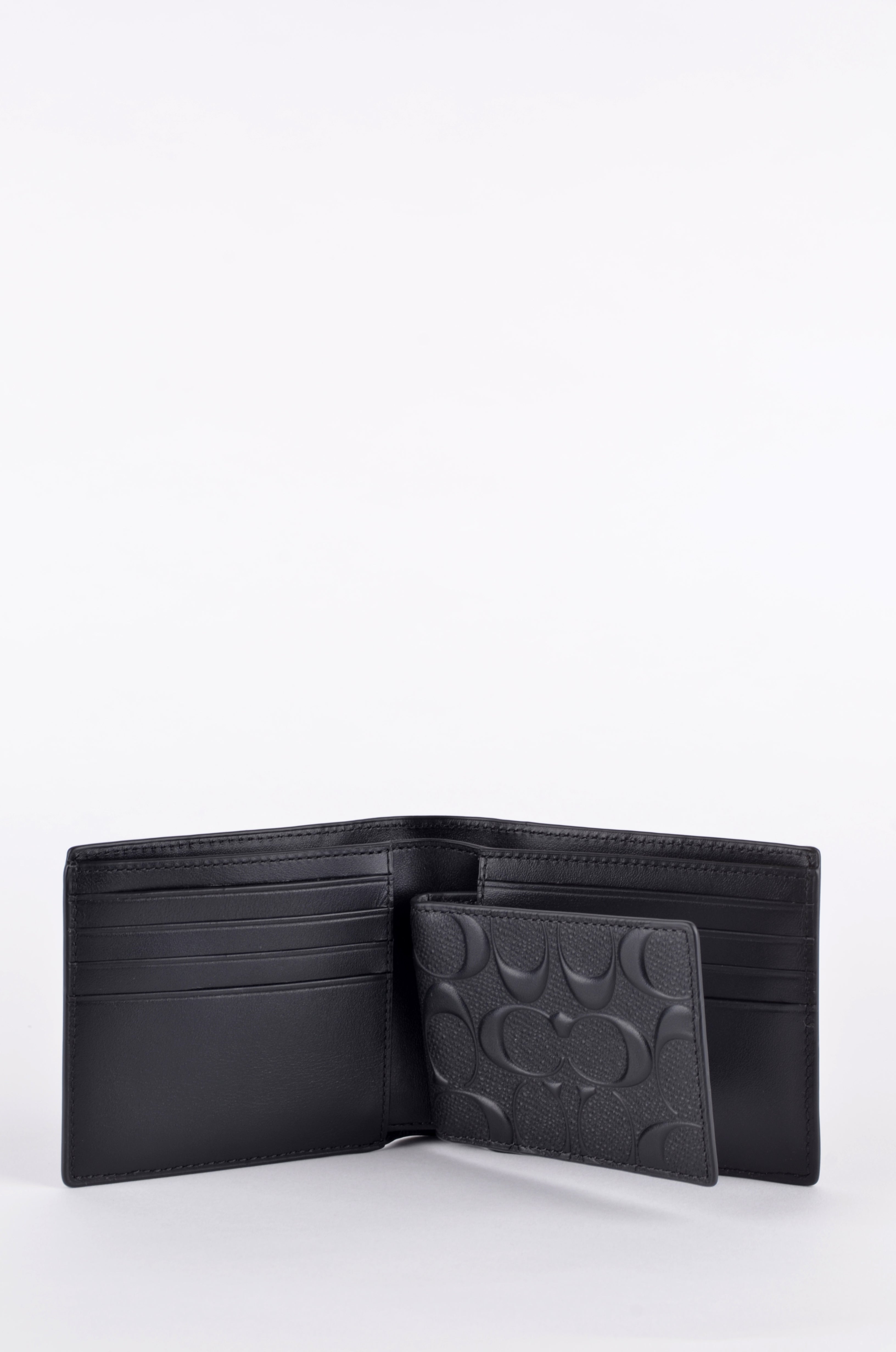 Cartera Coach Negra Signature en Relieve