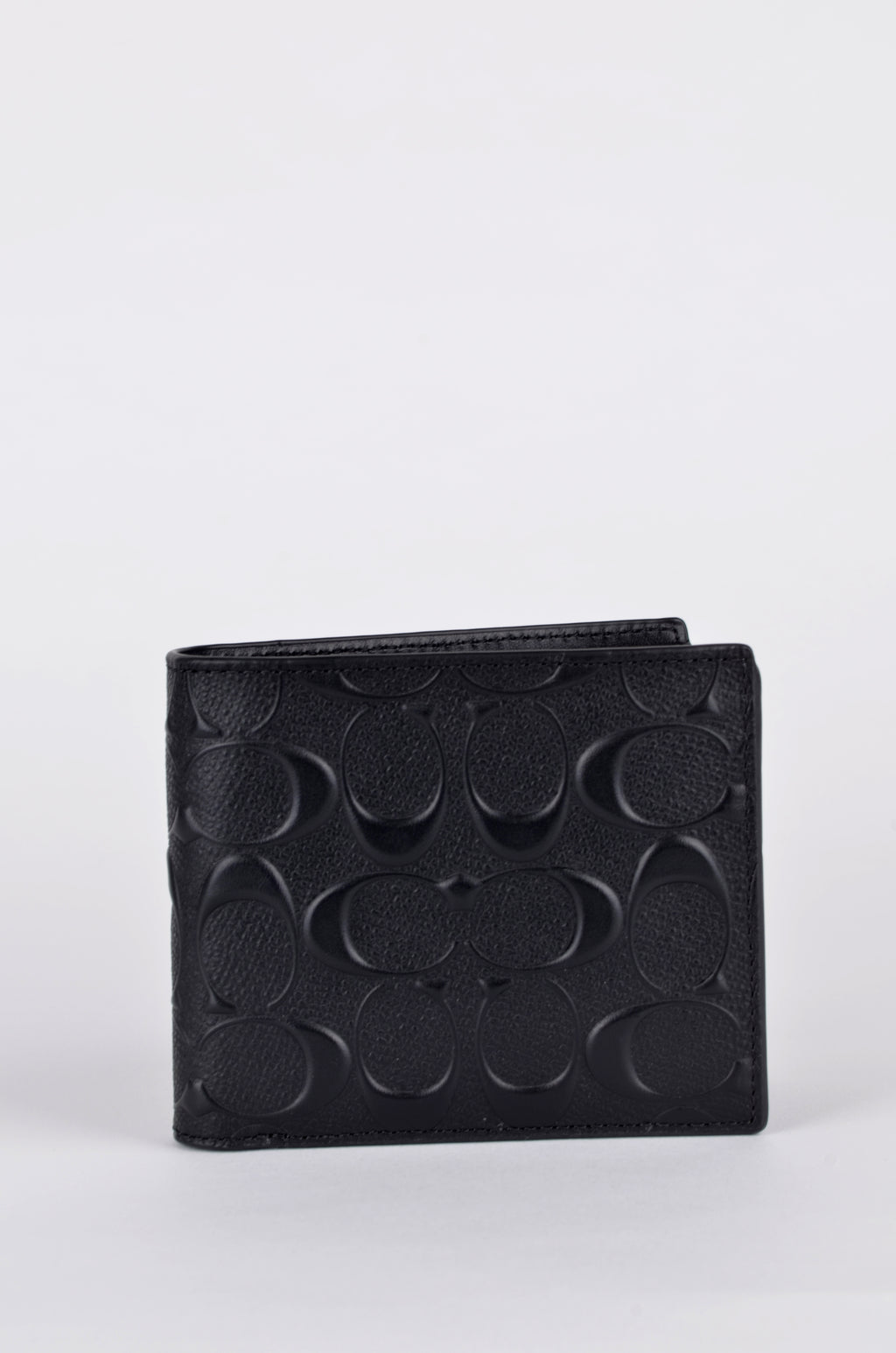 Cartera Coach Negra Signature en Relieve