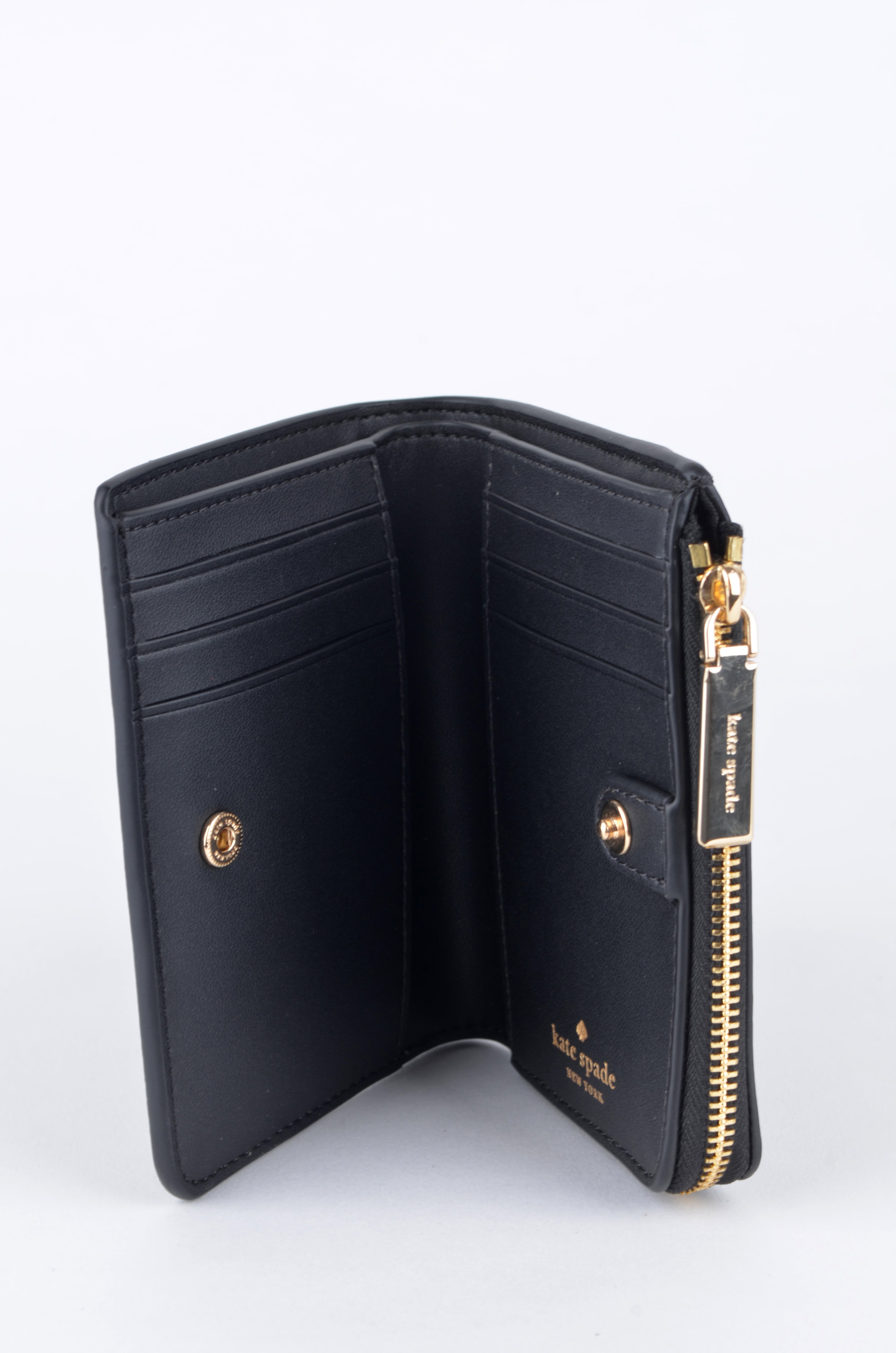 CARTERA CON MUÑEQUERA