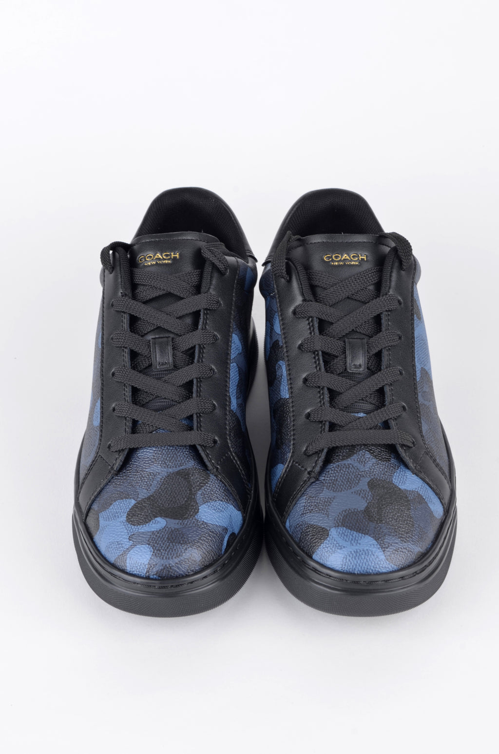 Tenis Coach Negros con Estampado Camuflaje Azul
